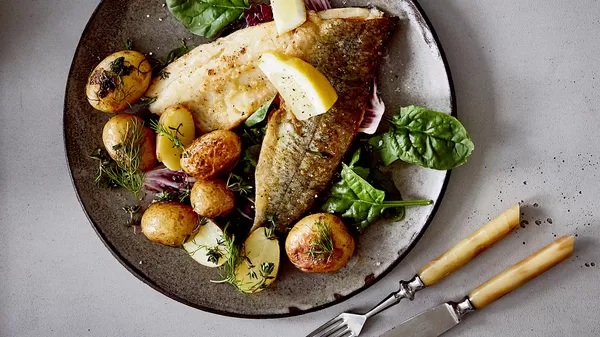 Trout with young potatoes and spring salad.