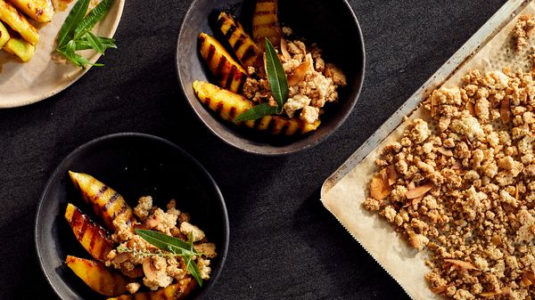 Grilled mango and coconut crumble served in bowls