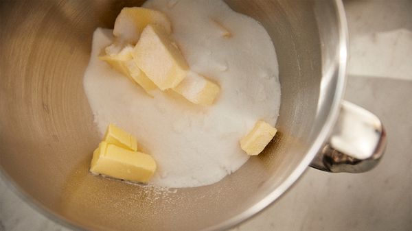 Butter and sugar mixed in a bowl.
