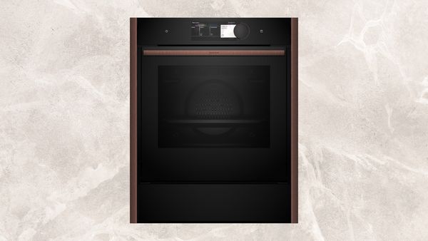 60cm oven plus 14cm warming drawer with Brushed Bronze Seamless Combination side strips  