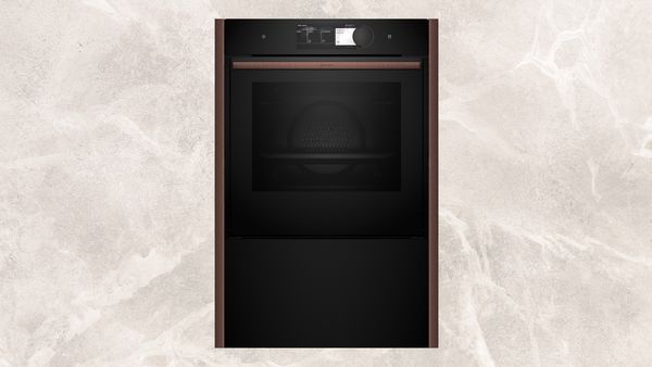 60cm oven plus 29cm warming drawer with Brushed Bronze Seamless Combination side strips  