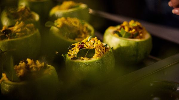 Bake stuffed courgettes in the oven until they are done