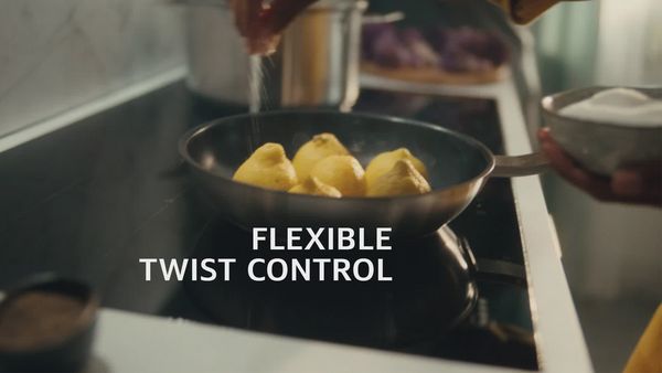 Vidéo montrant comment une table de cuisson est commandée avec un bouton Twist Pad en inox 