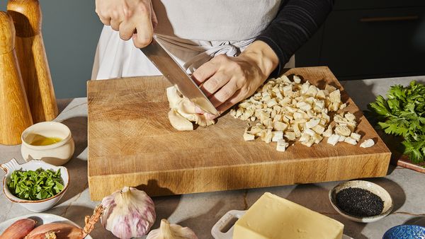 Mincing oyster mushrooms