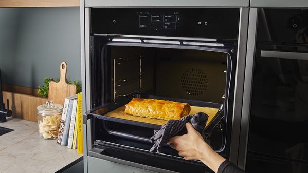 Golden brown baked strudel out of the oven