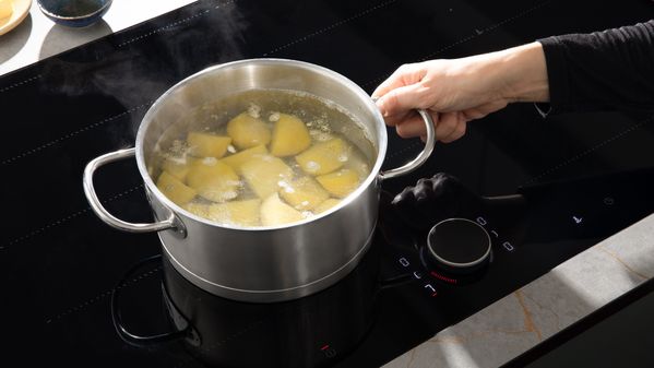Cooking potatoes in a cooktop