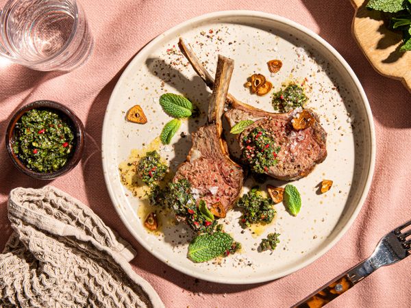 Roasted lamb with mint sauce served on a plate