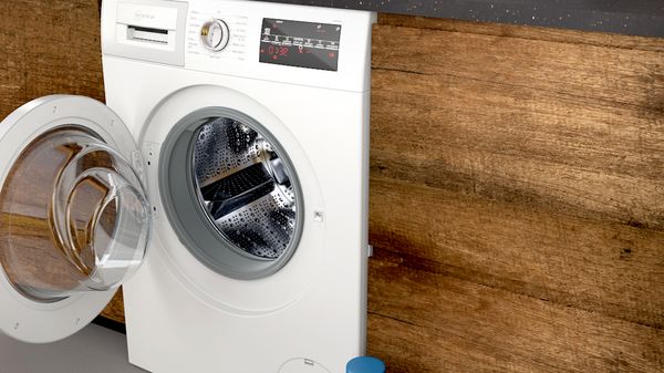 How can I protect my washing machine from scale