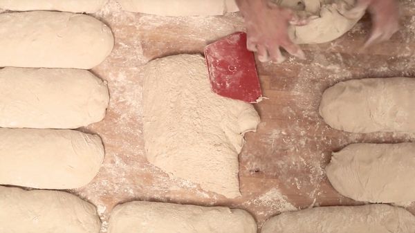 Bread dough being kneaded