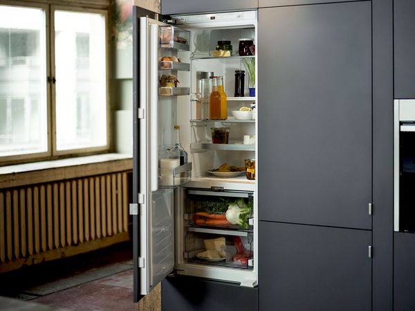 NEFF Fridge housed in a kitchen unit with the door open