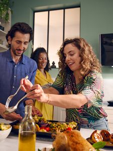 People cooking together in kitchen