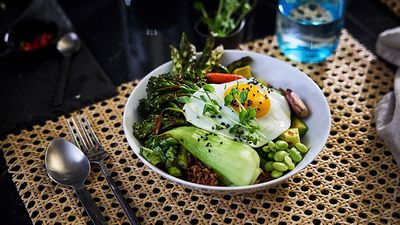 Bibimbap with vegetables, topped with fried egg