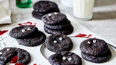 Black Halloween cookies with blood inside and white eyes