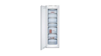 Vertical freezer with transparent drawers showcasing neatly arranged frozen food. 