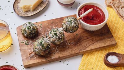 Spinach and Cheese Dumplings with Tomato-​Date  Sauce