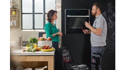 Engineer repairing a NEFF Oven