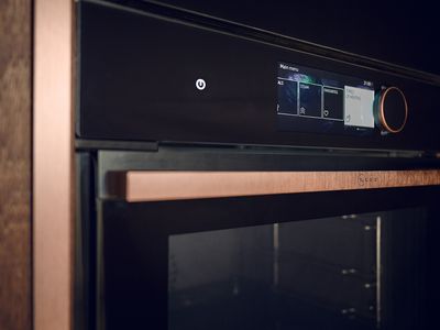 Close-up of N90 oven display with Brushed Bronze side trims