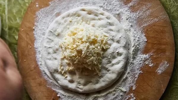 Flatbread dough on flour base