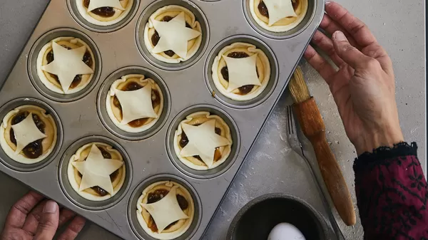 Mince pies in tray before baking