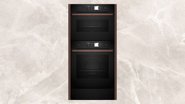 45cm compact oven plus 60cm oven plus 14cm warming drawer with Brushed Bronze Seamless Combination side strips  