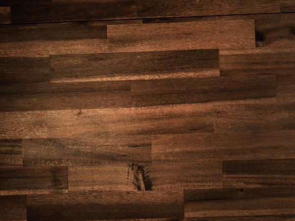 Desginboden mit dunkler Holz Textur