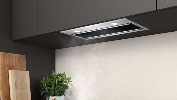 Flush integrated canopy cooker hood stainless steel, dark grey kitchen cupboards 
