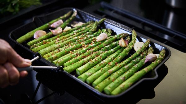 Grill asparagus in oiled pan on all sides