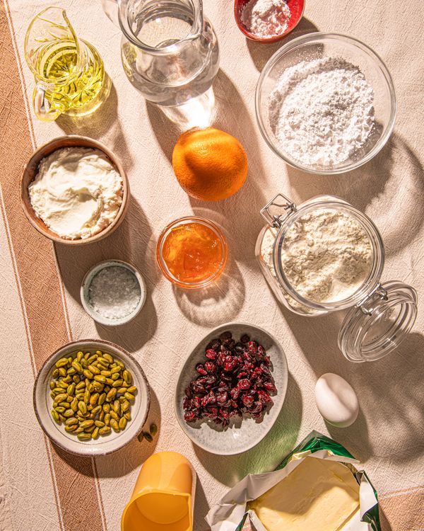 Ingredients for a braided Easter bread with pistachio and cranberry filling