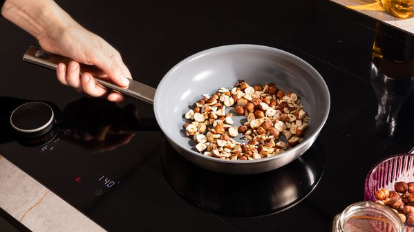 Roasting hazelnuts in a dry pan