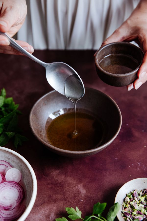 Dressing mixed in a small bowl. 