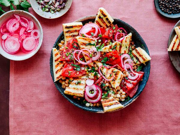 Grilled watermelon halloumi salad served in a bowl and ready to be enjoyed.