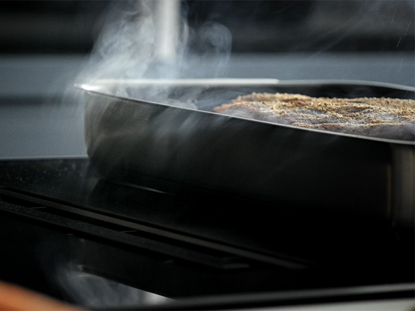 Steam going down into vented hob