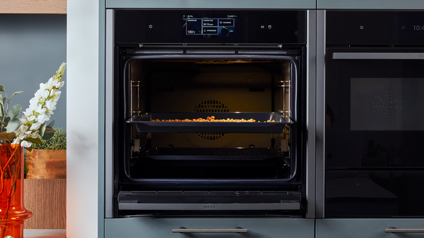 AirFry Backblech auf Einschubhöhe 3 schieben.