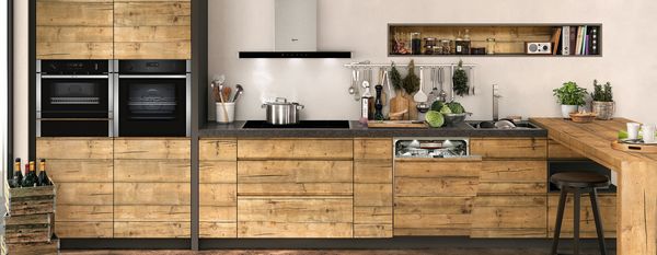 Wooden kitchen with multiple NEFF appliances