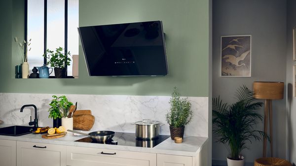 Wall mounted hood in the moder kitchen design