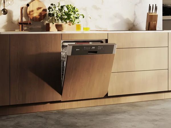 A contemporary kitchen featuring a sleek dishwasher and a stylish sink, showcasing modern design elements.