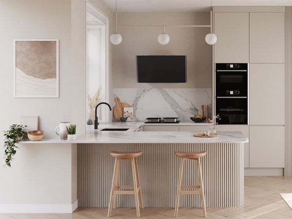 A stylish kitchen design with a pristine white countertop and warm wooden stools for a cozy dining experience.