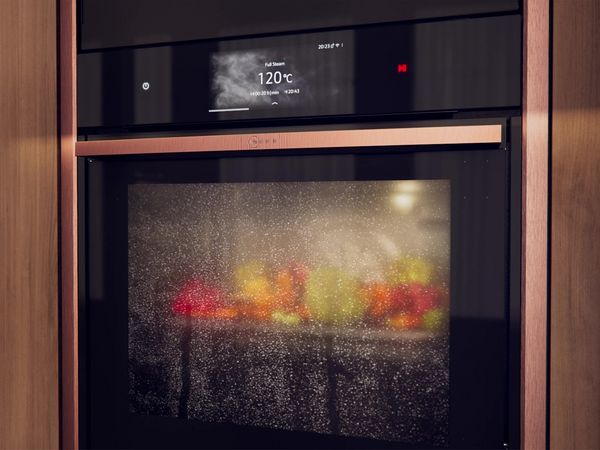 Forno NEFF con funzione vapore attiva durante la cottura delle verdure