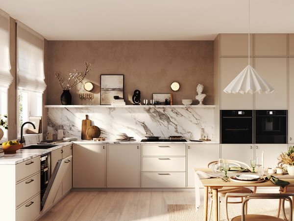 Light and open kitchen with numerous NEFF appliances