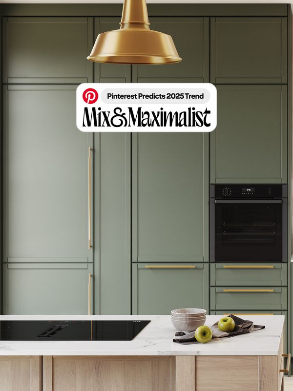 A modern kitchen featuring wooden cabinets and a spacious kitchen island, creating an inviting cooking space.