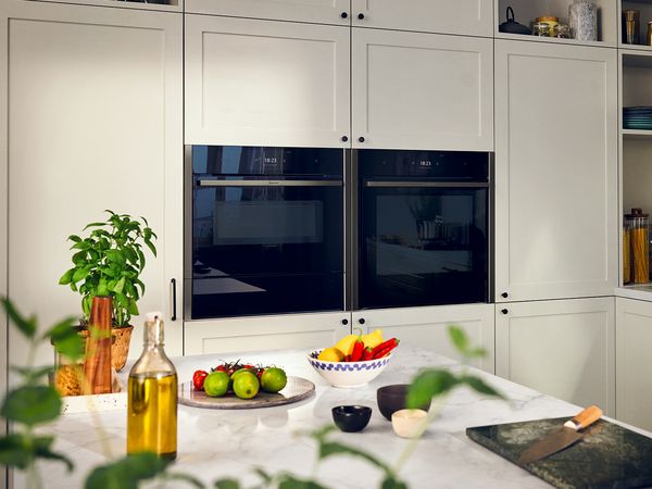 Bright and colourful kitchen with multiple NEFF appliances