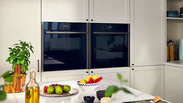 Bright and colourful kitchen with multiple NEFF appliances