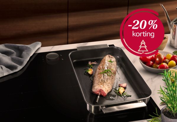 Keukenapparatuur van NEFF kookplaten en ovens met accessoires. Button met 20% korting in kerstthema