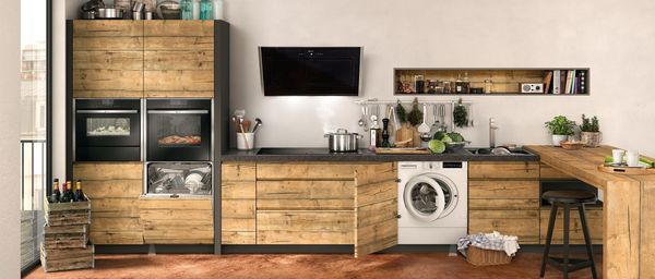 Wood kitchen featuring NEFF built-in appliances