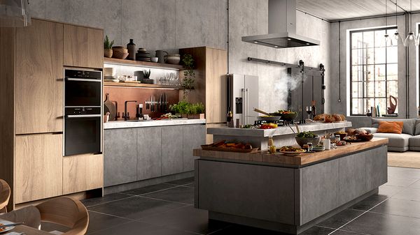 Wood and slate styled kitchen with NEFF N 70 built-in appliances