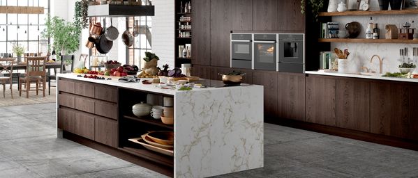 Oak and marble styled kitchen featuring NEFF N 90 Ovens