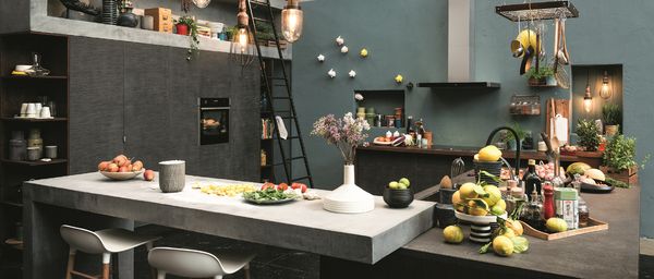 Modern nature inspired kitchen featuring NEFF built-in apppliances