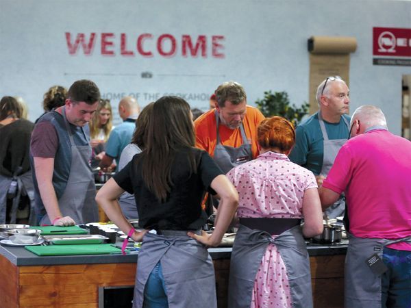 People participating in NEFF live cooking event